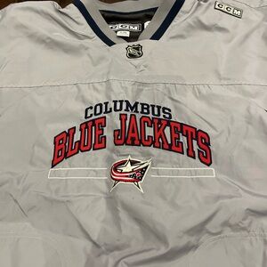 CCM Gray NHL Jersey with Blue and Red Accents